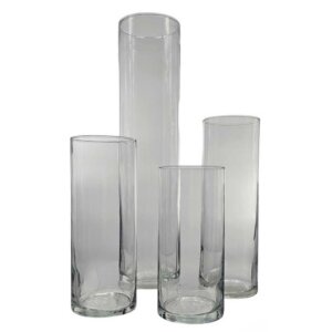 Four glass cylindrical candle holders
