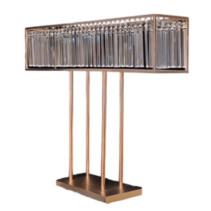 A copper, rose-gold decorative centerpiece with crystal pieces hanging from the center of a rectangular prism