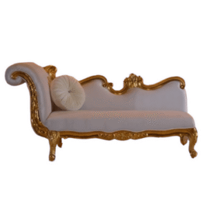 an orange lounge sofa with baroque gold trim and white fabric