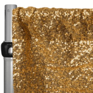 A gold sequined curtain
