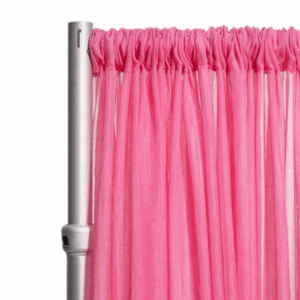 A pink curtain, not quite hot pink but more of a flamingo pink shade