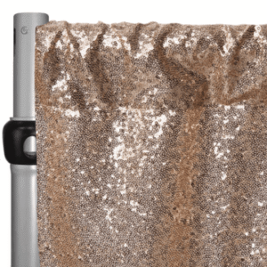 A champagne/pale rose gold sequined curtain