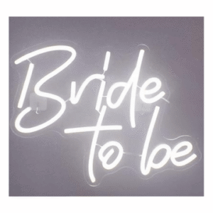 A white neon sign reading "Bride to be"