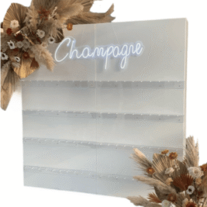 White champagne wall with neon sign